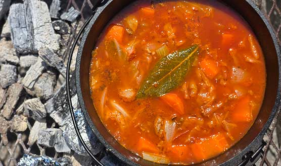 Enjoying warm borscht under the slightly chilly autumn sky